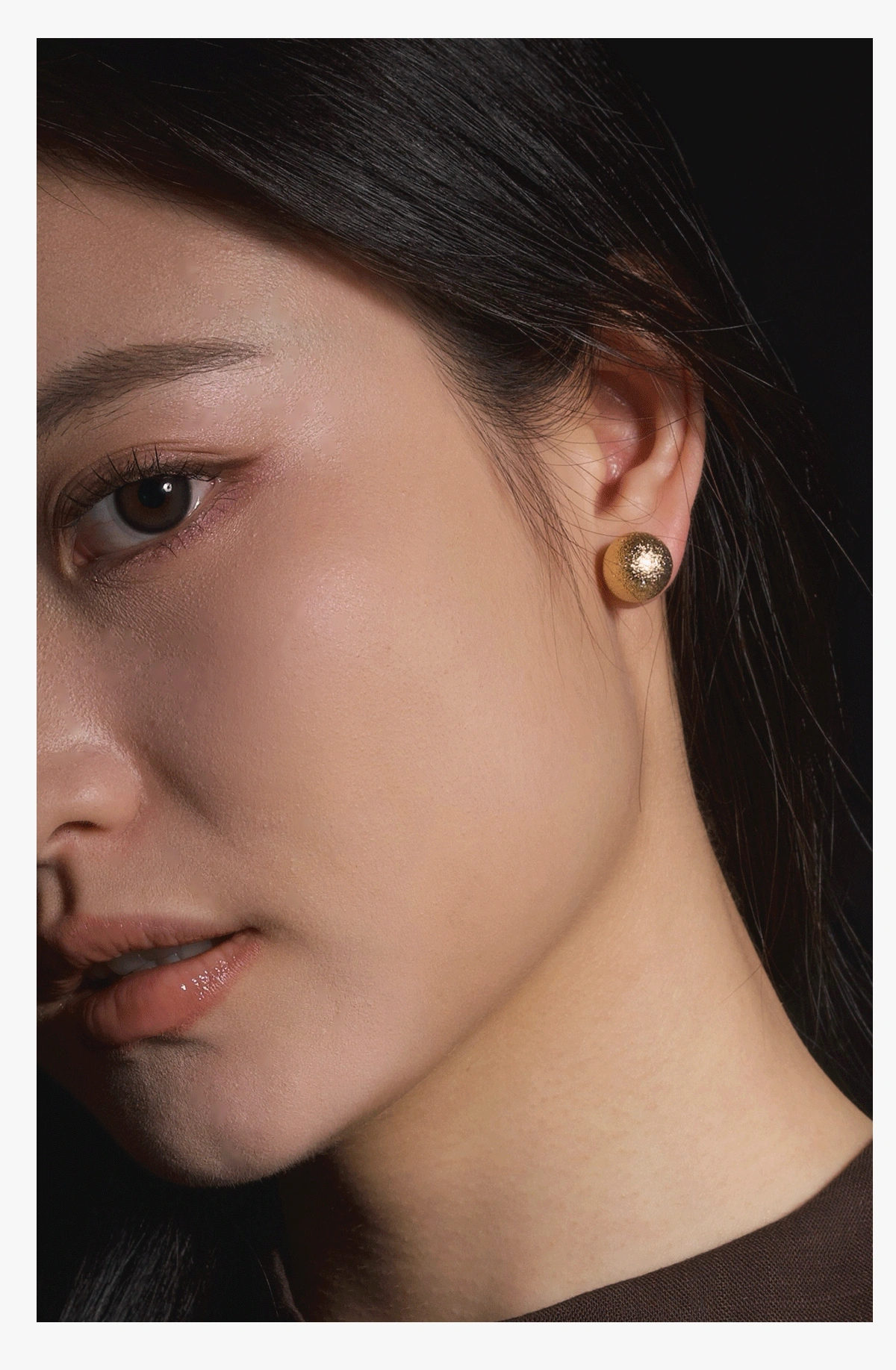 Model styling the Lunar 12mm Gold Ball Earrings with Hypoallergenic S925 Post